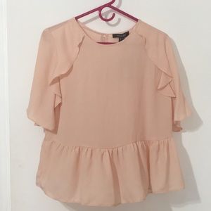 Pink top with ruffles
